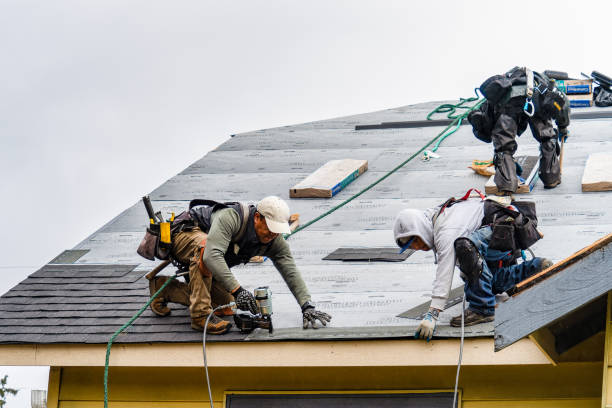 Professional Roofing technician working in Union City, NJ